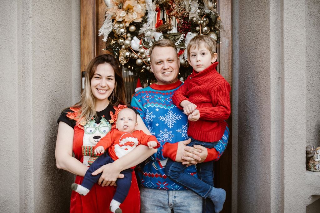 family with ugly Christmas sweaters