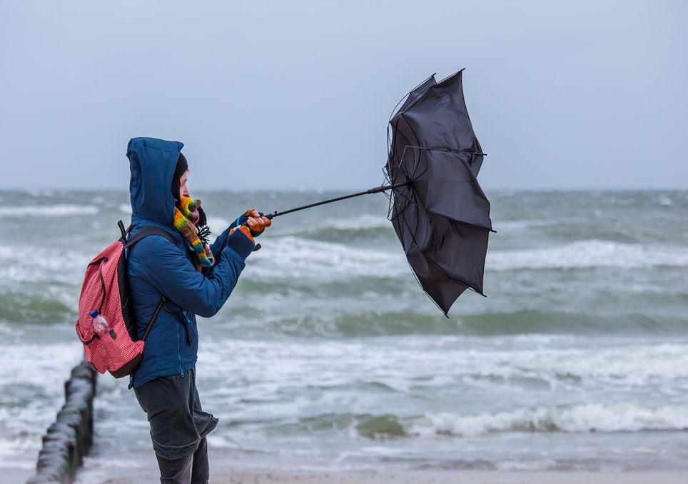 Woman on windy beach