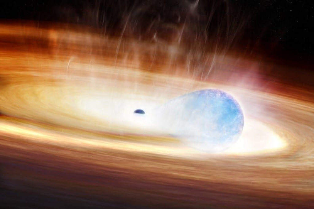 Estrela pode ter tentado engolir buraco negro e fenômeno causou uma supernova nunca observada antes. Crédito: Harvard-Smithsonian Center for Astrophysics Estrela pode ter tentado engolir buraco negro e fenômeno causou uma supernova nunca observada antes. Crédito: Harvard-Smithsonian Center for Astrophysics