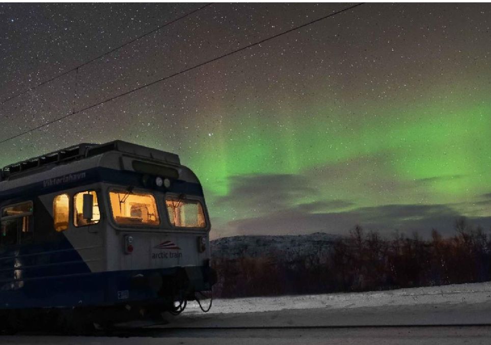 narkiv tres y auroras en noruega