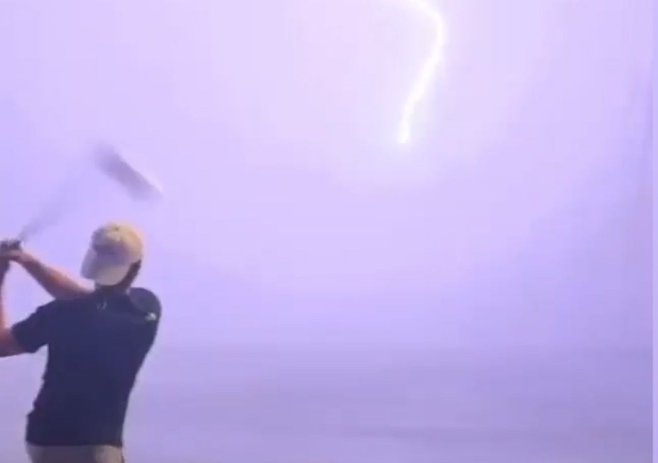 A golf ball is struck by lightning … in mid-flight!