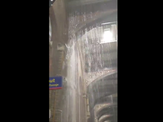 Water floods into London's Liverpool Street station