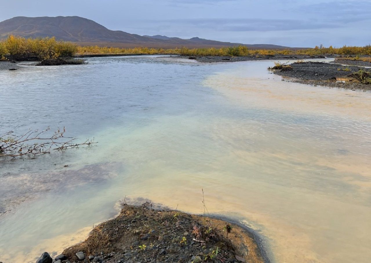 Why do arctic rivers in Alaska turn orange?