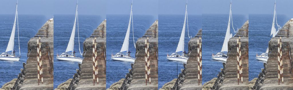Un pequeño yate navega inocente a un punto de destino. Es atrapado. Su casco se dobla y se ajusta para que coincida con las aguas que caen en picado. Aparejo, el palo y la vela se estiran hacia los lados y hacia arriba.